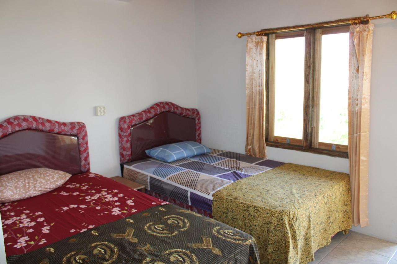 Feby'S Homestay Ekas Extérieur photo